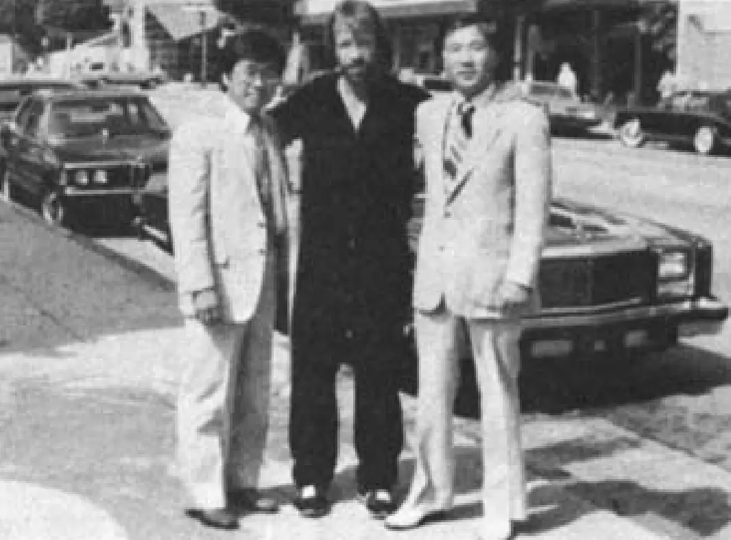 Chuck Norris greets Grandmaster Shin, his first instructor, Hollywood, CA 1985